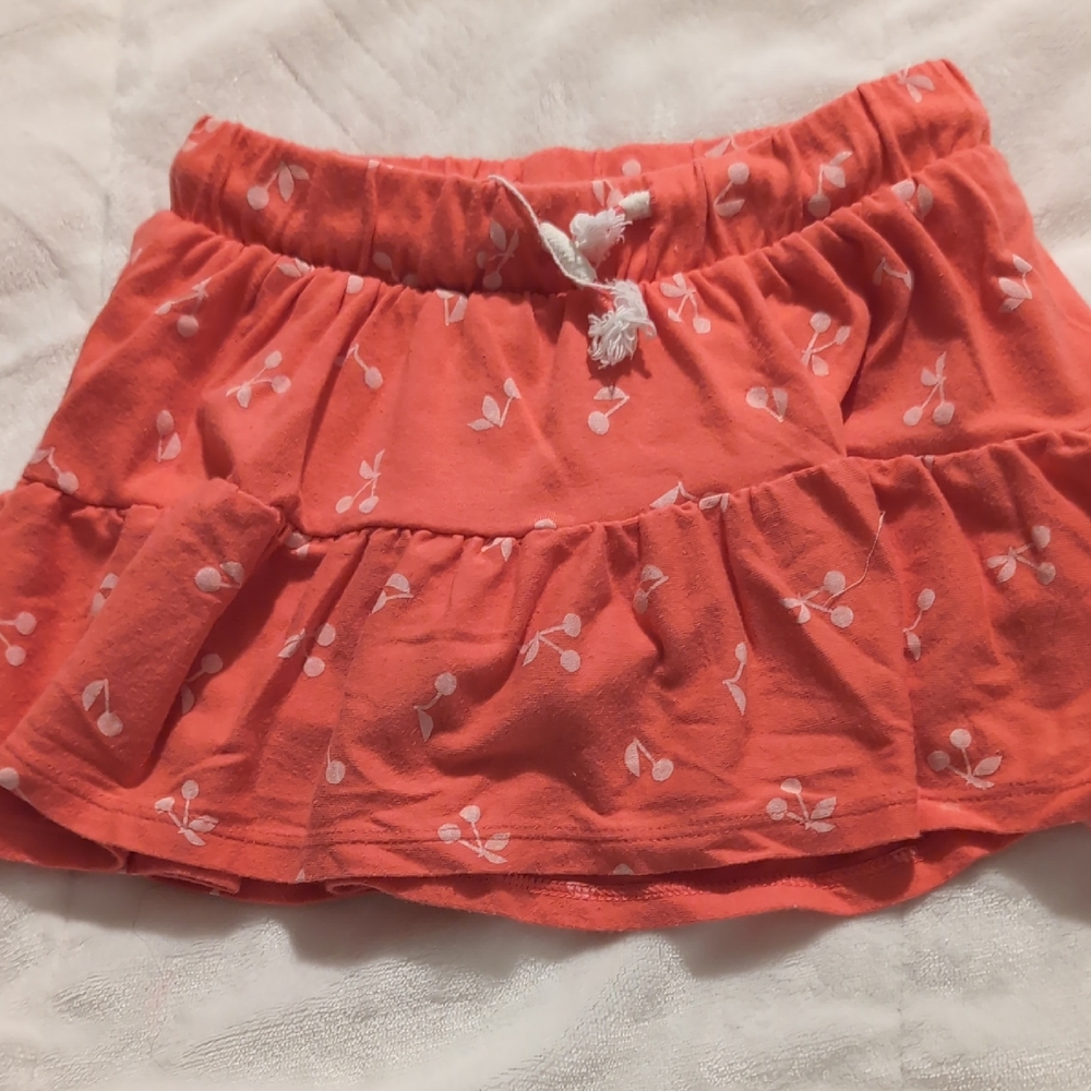 Coral Skirt with White Floral Pattern